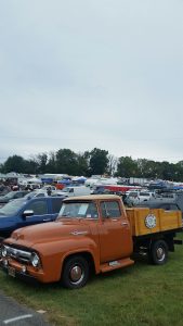 ford f100 custom orange pickup - Carlisle Car Show