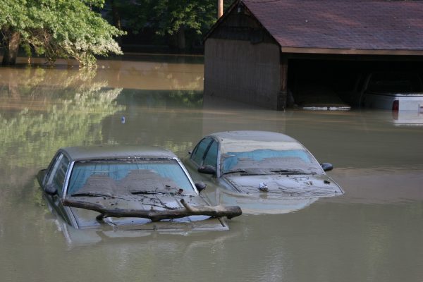 two cars underwater in flood