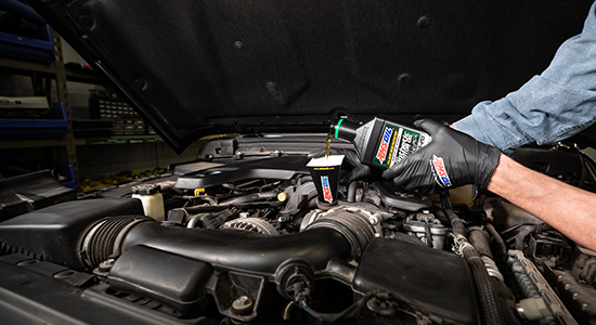 AMSOIL Signature Series Motor Oil is installed in a vehicle.