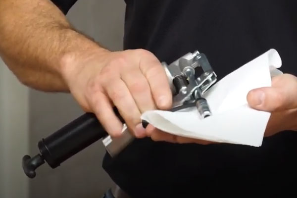How to load a grease gun