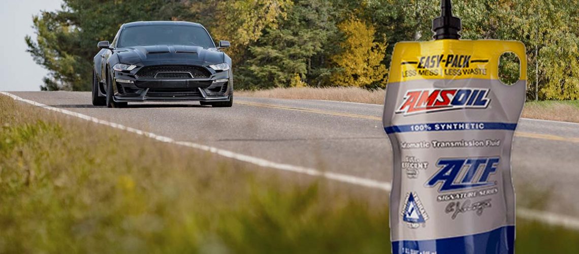 Ford Mustang on the road with an "Easy-Pack" of AMSOIL Automatic Transmission Fluid