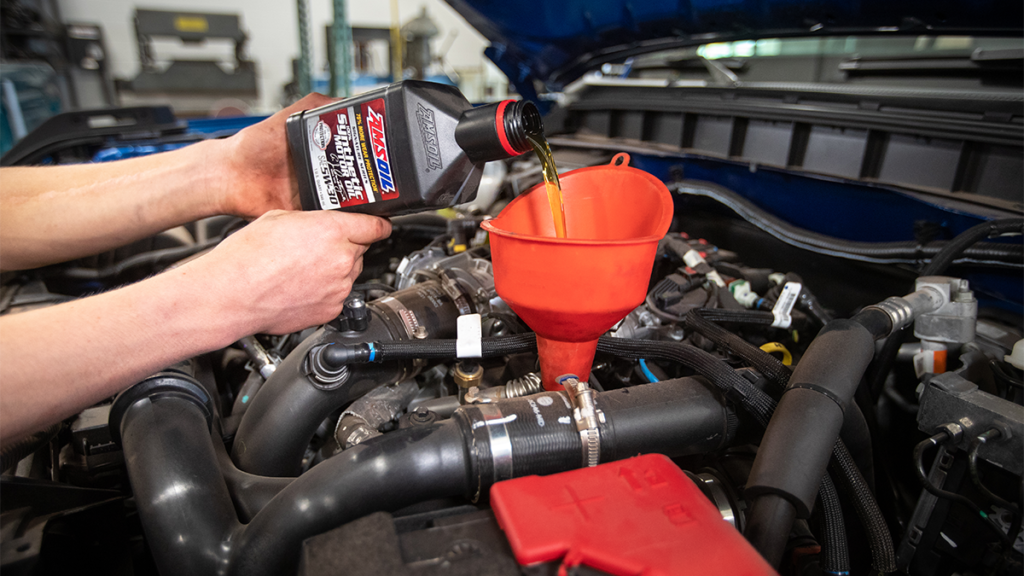 Motor oil is added to engine.