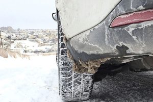 Clean road salt to prevent rust on a car.