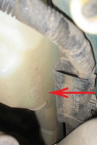 How to check coolant level. 