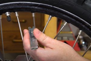 How to tighten dirt bike spokes.