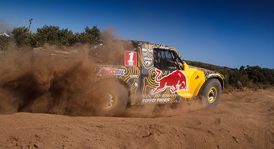 Menzies truck tears down a dusty trail in Baja, Mexico.