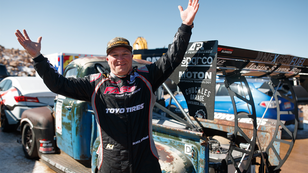 Scott Birdsall with his Pikes Peak record-holding truck, Old Smokey.