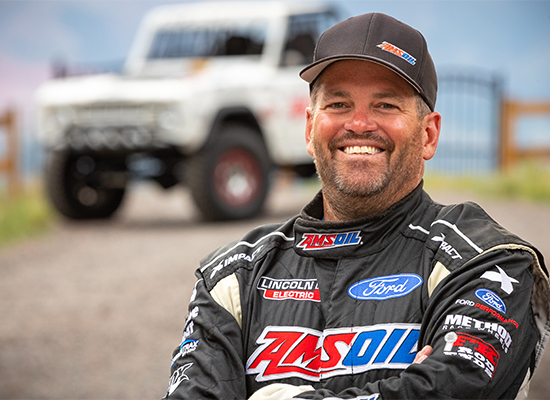 Brad Lovell with his Bronco race truck.