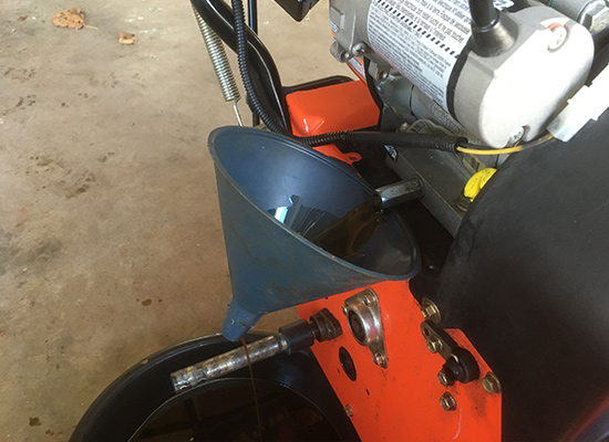 Changing snowblower oil