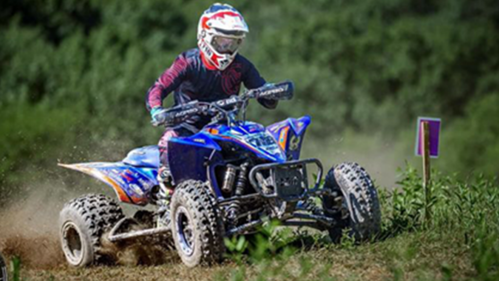 Logan Steele races his four-wheeler.