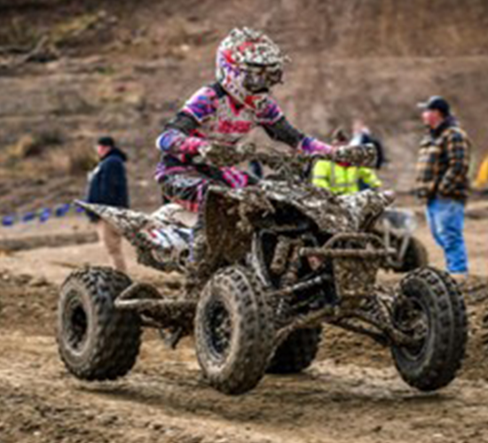 Logan Steele takes on a muddy track.