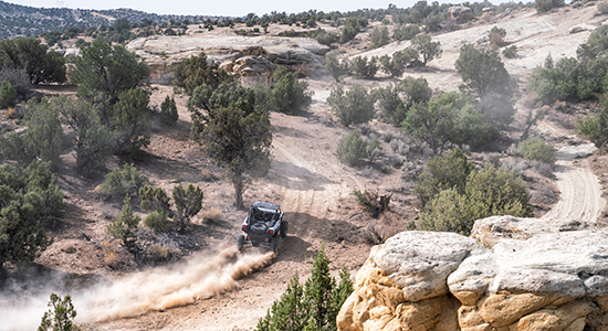 A Kawasaki Teryx KRX 1000 takes on a remote western trail.