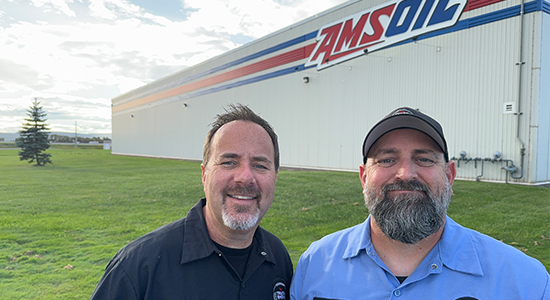 Lightning and Holman of the Truck Show Podcast stand outside AMSOIL Center in Superior, Wis.