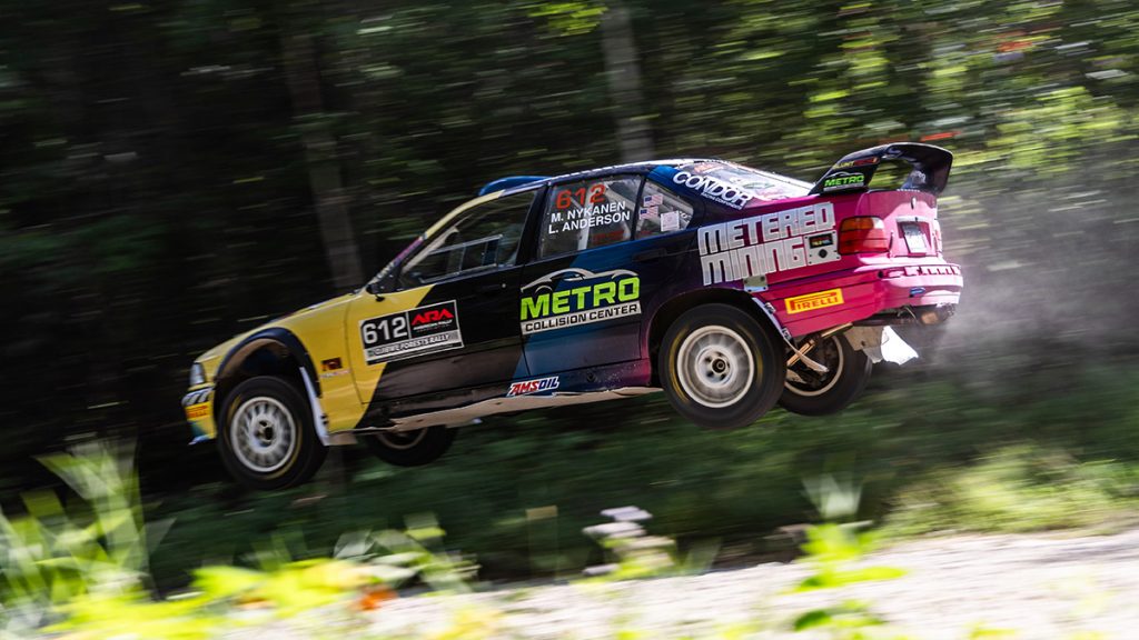 Matthew Nykanen takes big air in his BMW rally racecar.