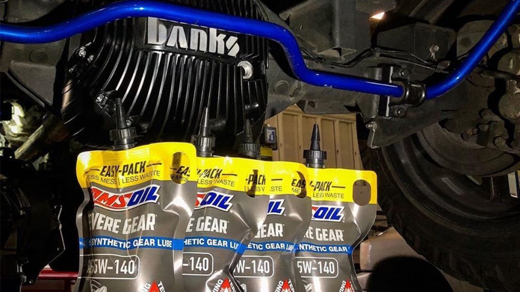 A differential cover made by Banks Performance Engineering shown with AMSOIL SEVERE GEAR Gear Lube.