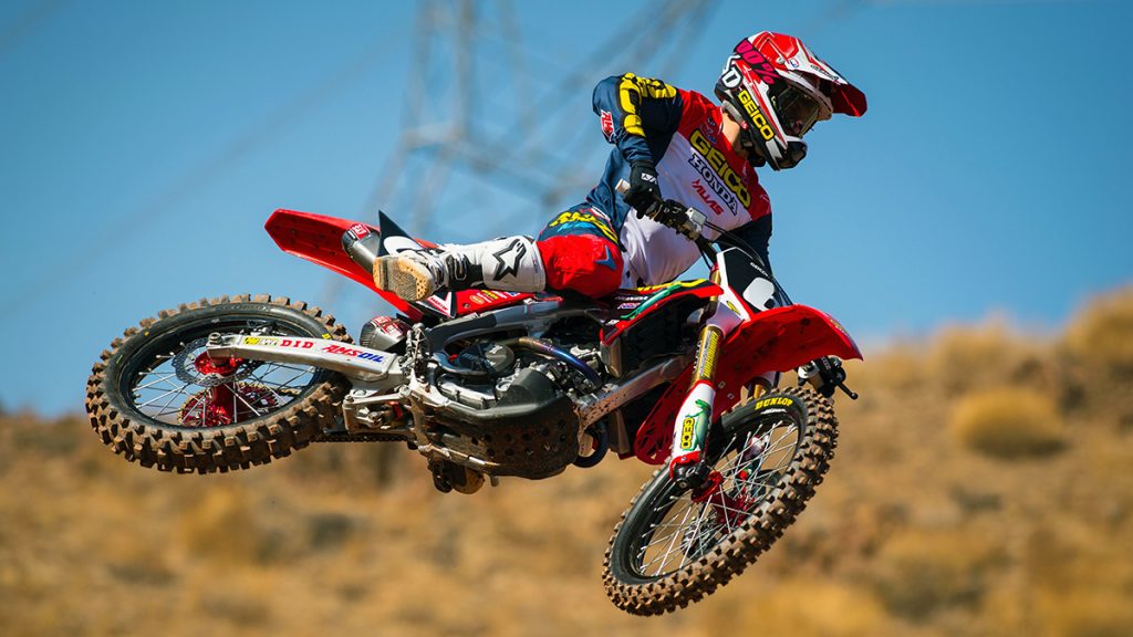 A GEICO Honda rider jumps a dirt bike